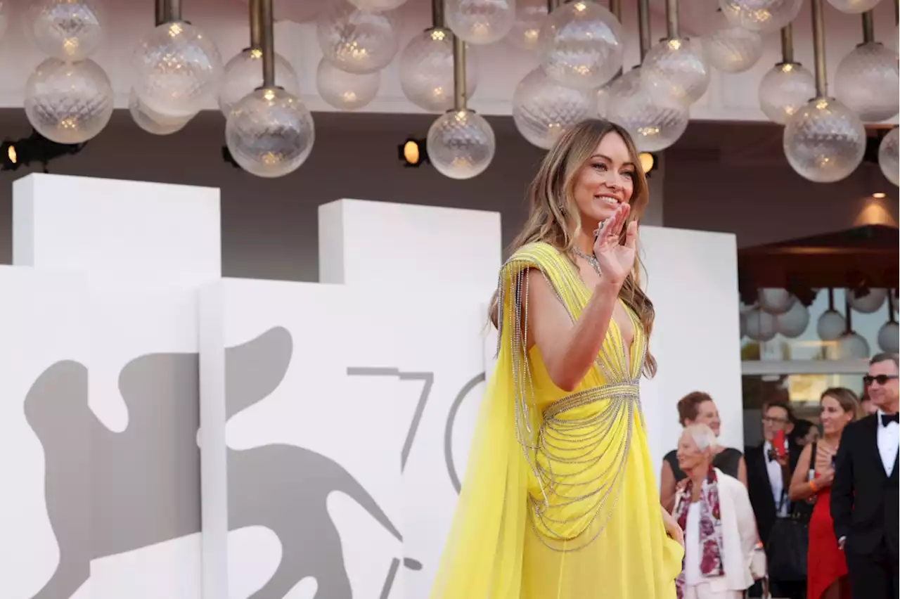 Olivia Wilde Dazzles in Plunging Yellow Gucci Dress for ‘Don’t Worry Darling’ Premiere at Venice Film Festival