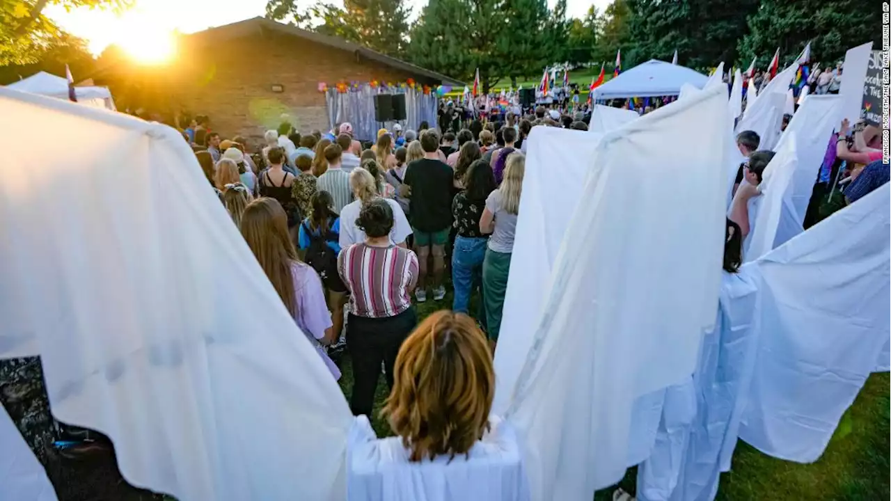 People dressed in angel wings shielded LGBTQ students attending BYU from protesters