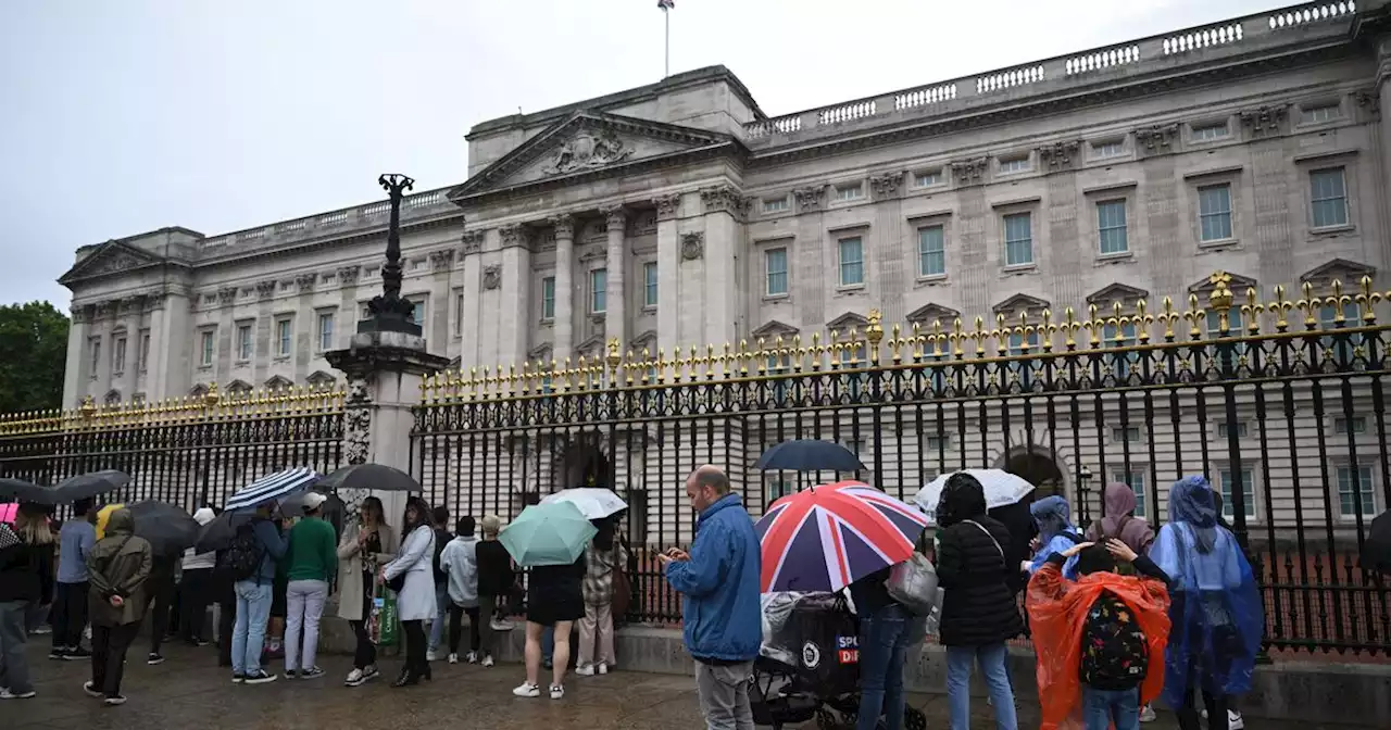 Buckingham Palace crowds gather as they await news on the Queen