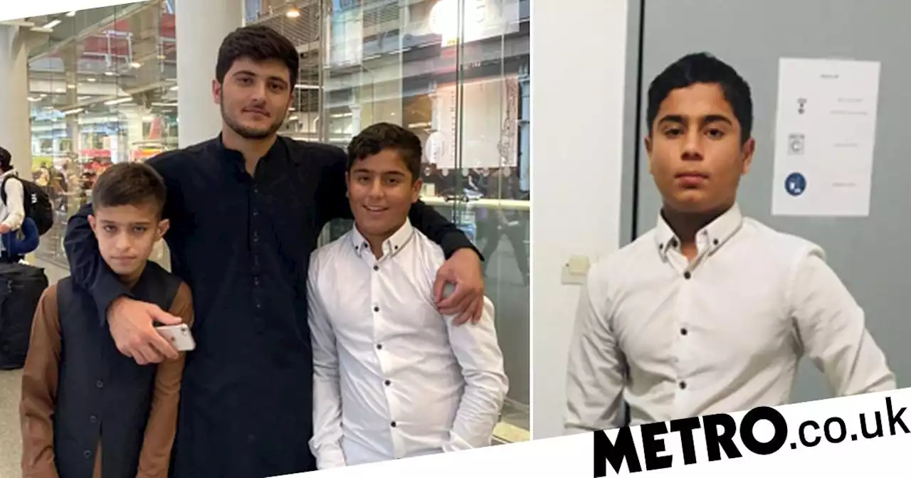 Afghan boy reunited with twin in UK after being stranded in France for a year