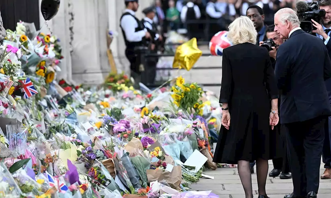 Emotional King Charles' heartfelt gesture to Camilla as they arrive at Buckingham Palace after Queen's death