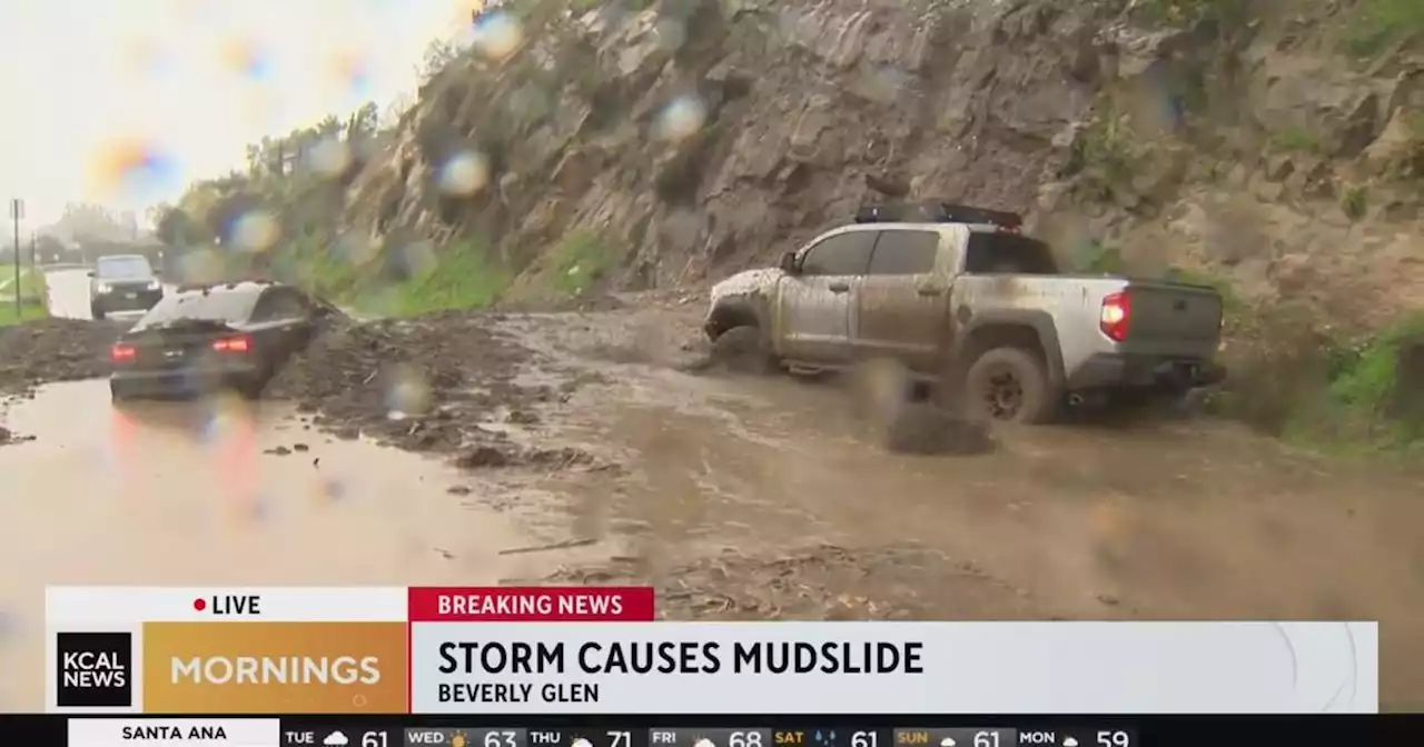 Beverly Glen mudslide buries car in roadway