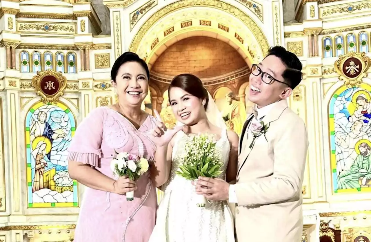 LOOK: Kakampink couple gets ex-VP Robredo as wedding godmother