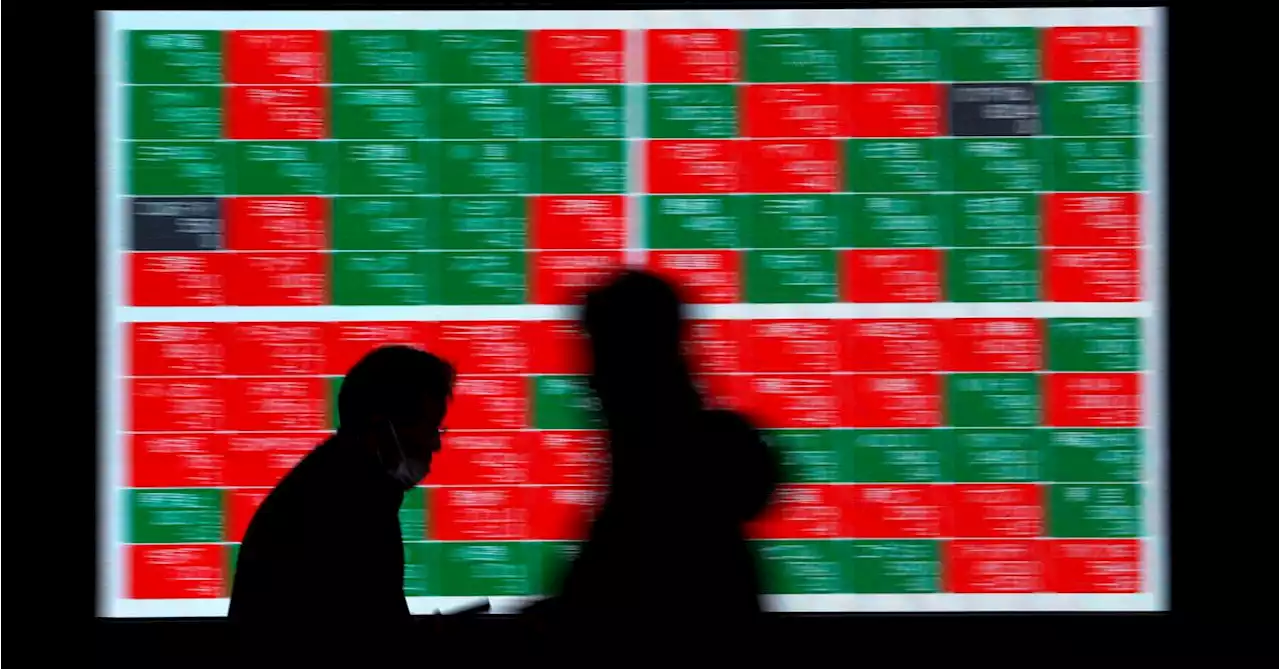 Asia shares dip on hawkish Fed remarks; commods rise on China reopening