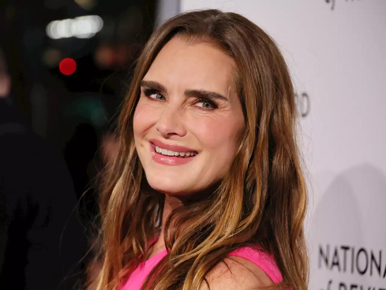 Brooke Shields Looks Electric in Showstopping Bright Pink Cut-Out Dress for the National Board of Review Awards