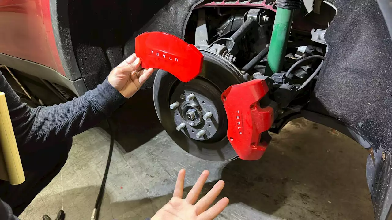 Tesla Hides Downgraded 2023 Model Y 'Performance Brakes' Behind Fancy Red Caliper Covers | Carscoops