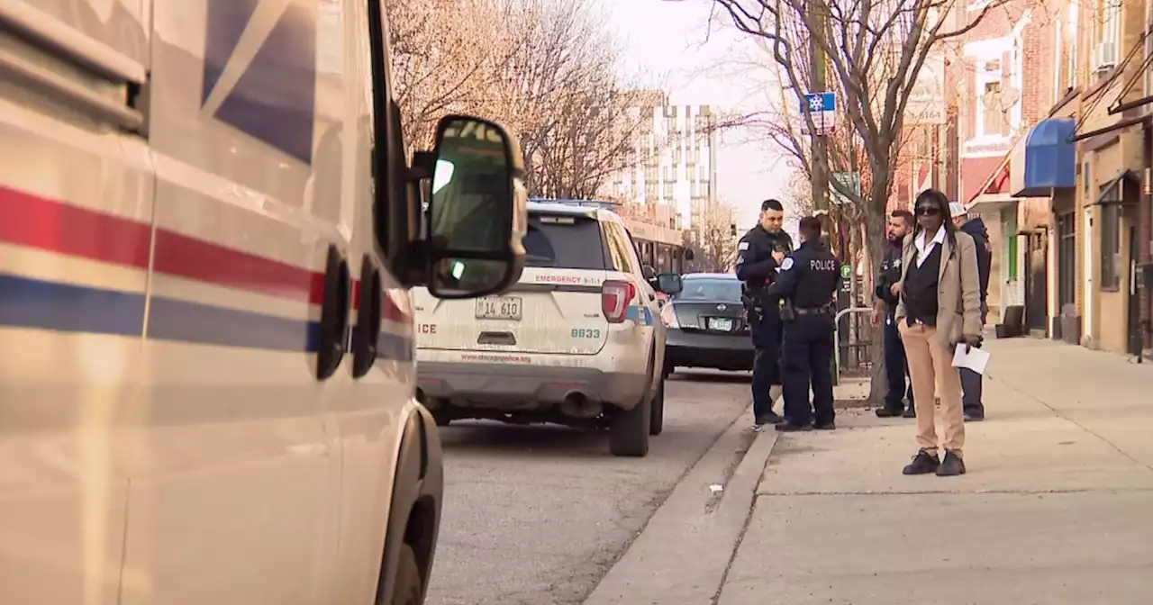 Postal truck struck by gunfire in West Town