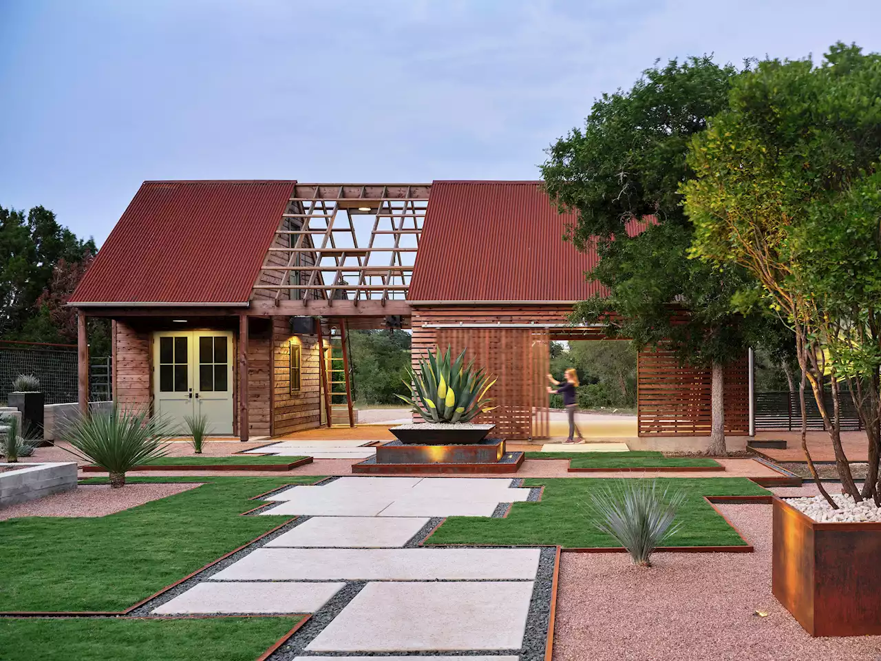 Award-winning, $125K barn-style garage built for entertaining