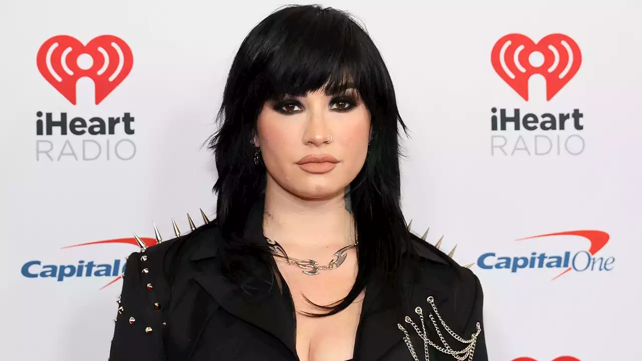 Demi Lovato's 'offensive to Christians' album posters banned, shows crucifix and bondage