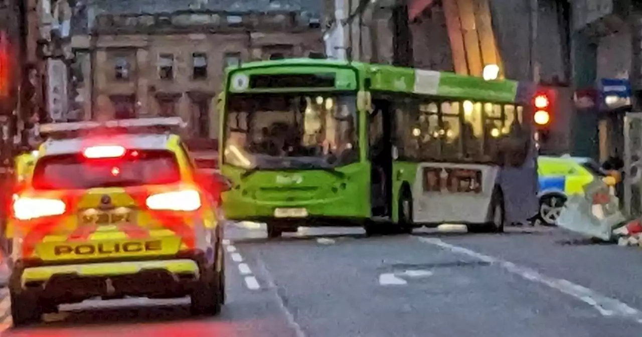 Woman rushed to hospital after being hit by bus in Glasgow city centre