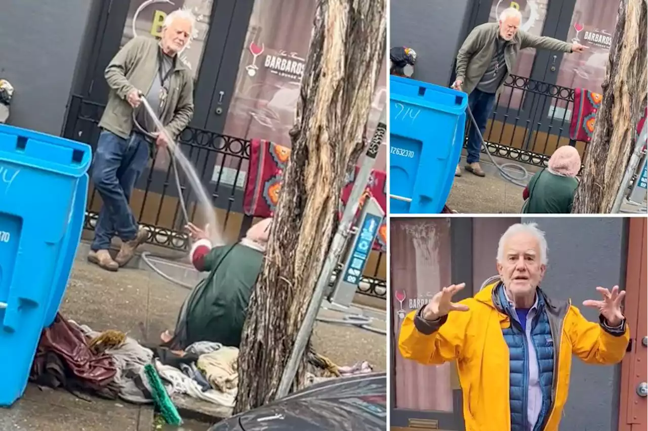 Heartless gallery owner soaks homeless woman with garden hose in viral video