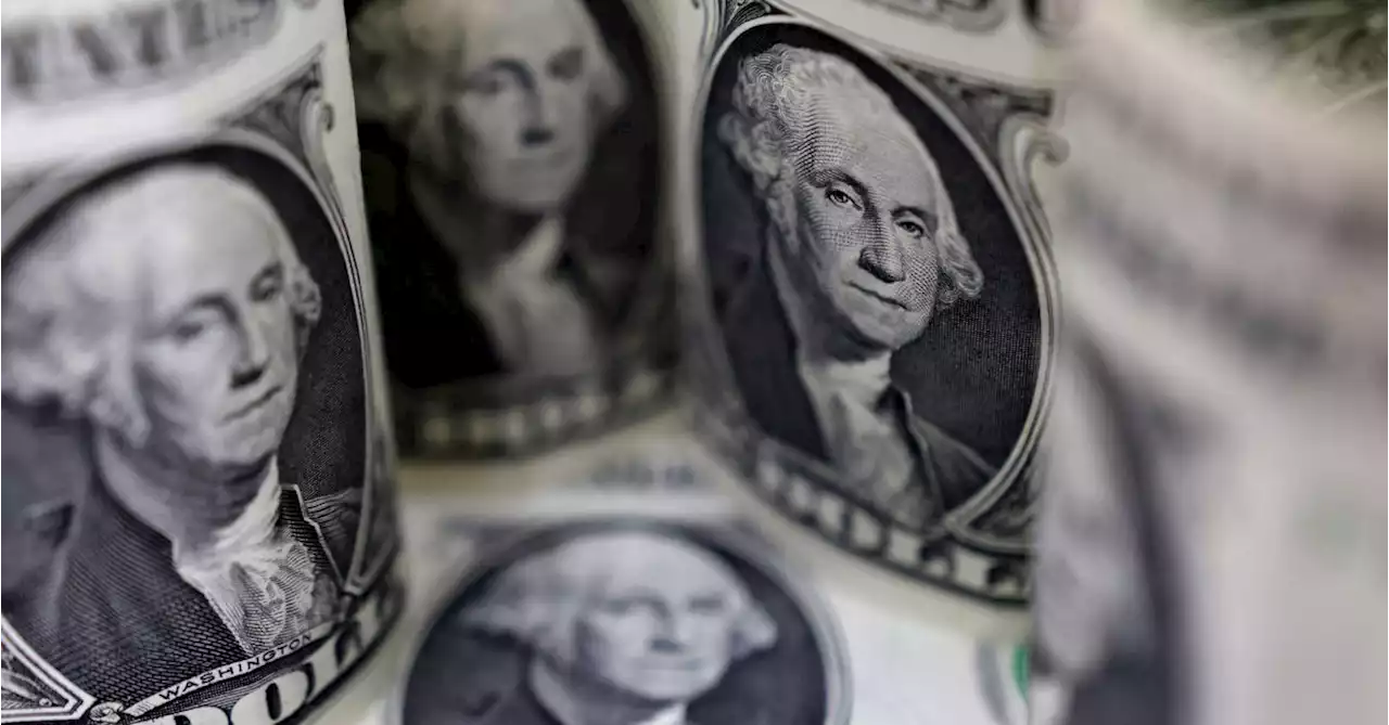 Dollar stands firm while traders await CPI