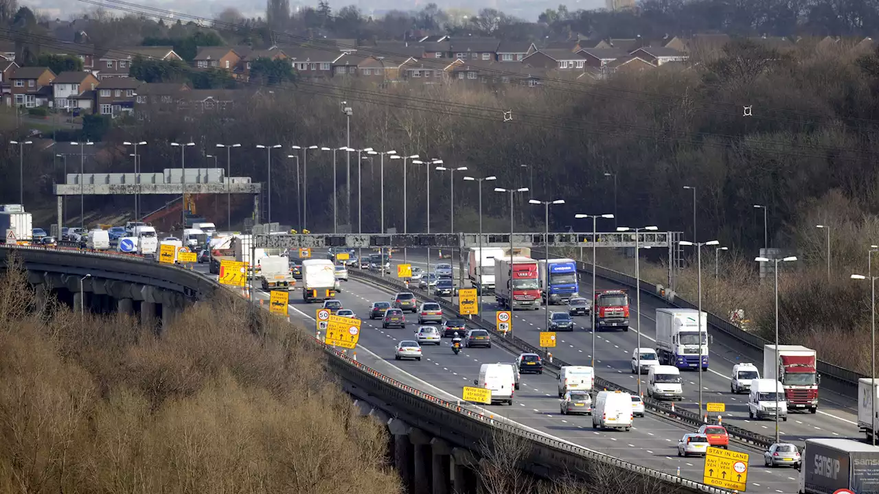 Twelve people injured in hospital as coach crashes into motorway bridge