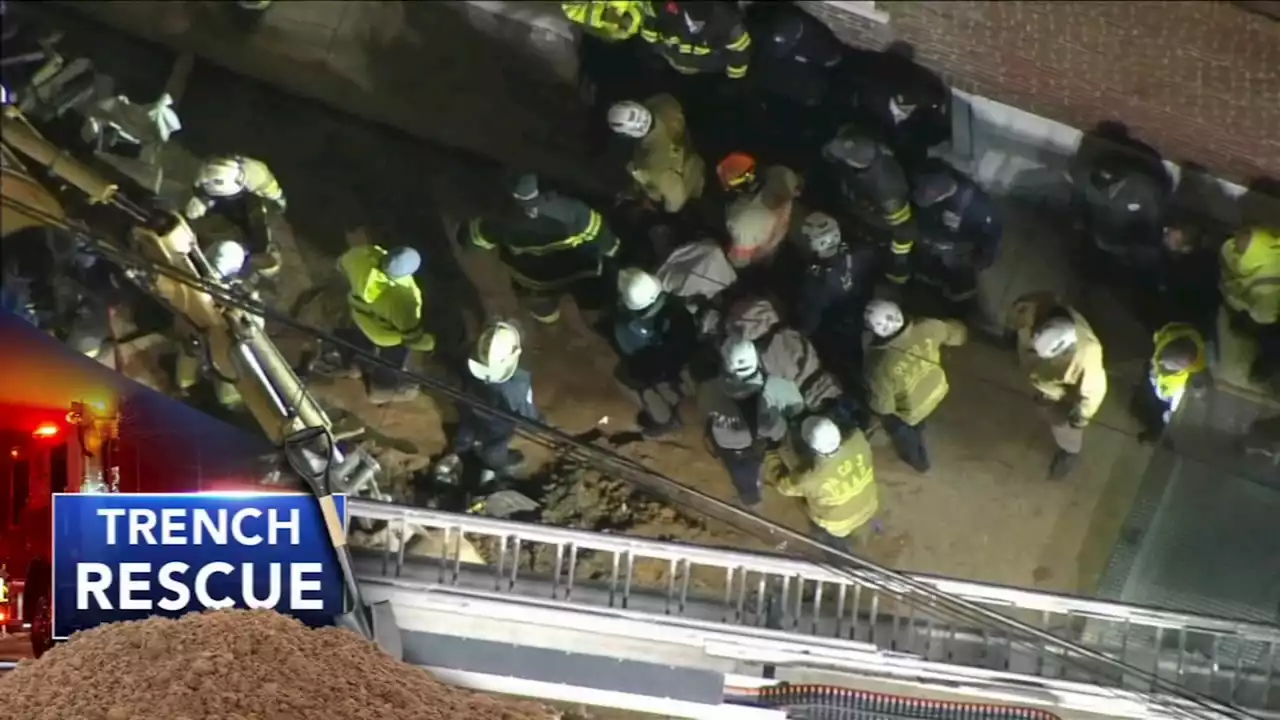 Worker freed after 8 hours in trench; wife tells trapped man she's pregnant during rescue