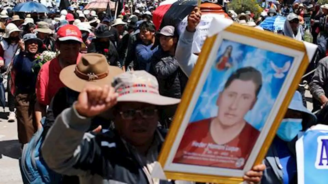 Peruvians march with coffins, photos of dead, anti-Boluarte banners