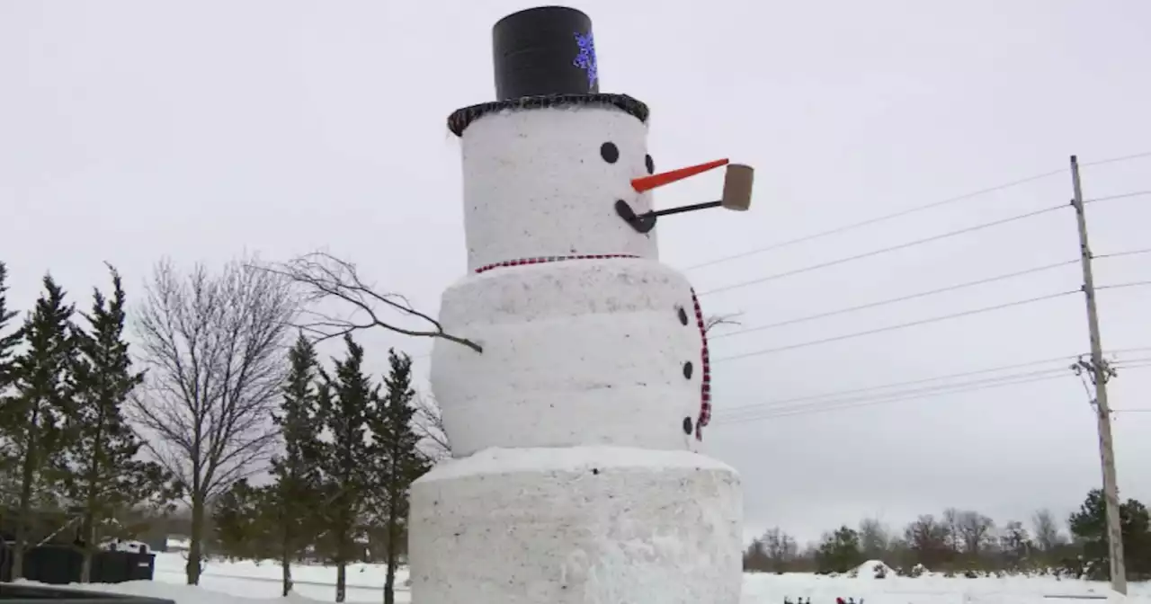 Wisconsin family builds giant snowman to honor late relative