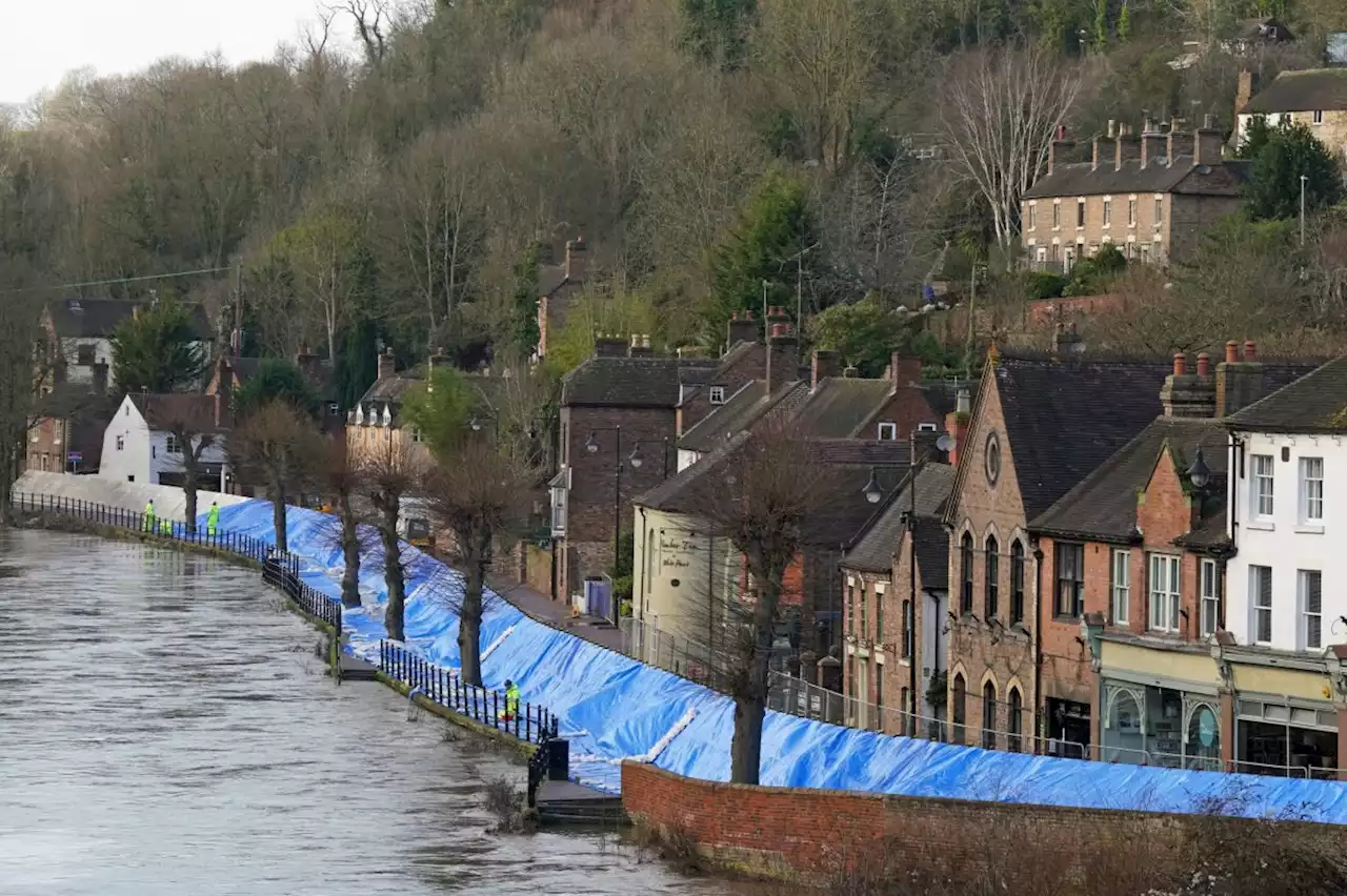 Warnings for more flooding across England on Friday and homes cut off in Wales after torrential