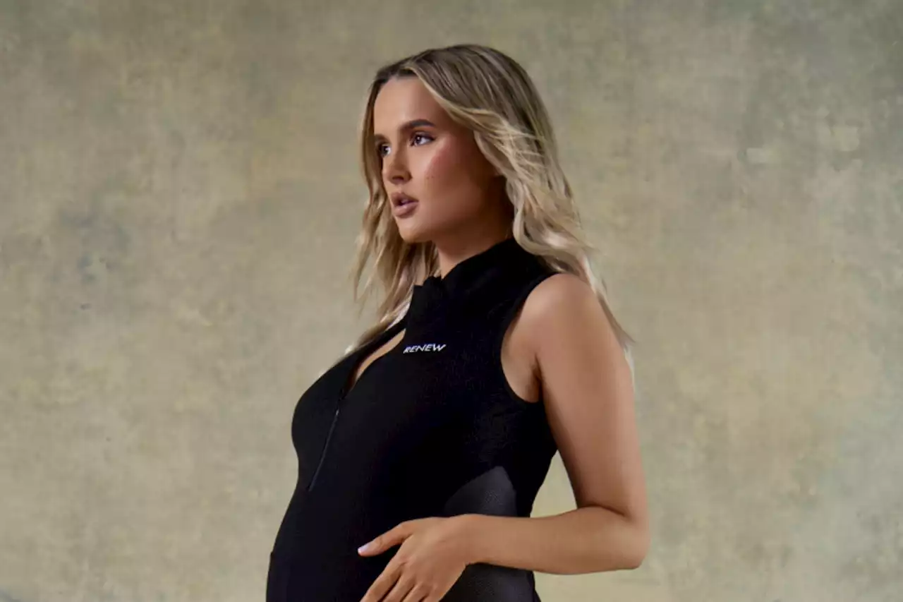 Molly-Mae Hague shows off blossoming baby bump in figure-hugging dress