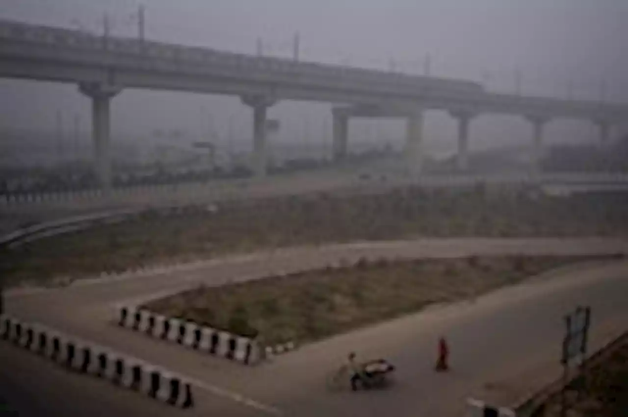 Socked in by smog, Indian officials invest heavily — in public relations