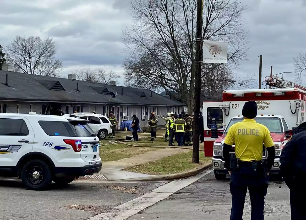 Shooting victim crashes vehicle into Birmingham apartment building; fire erupts, woman dead