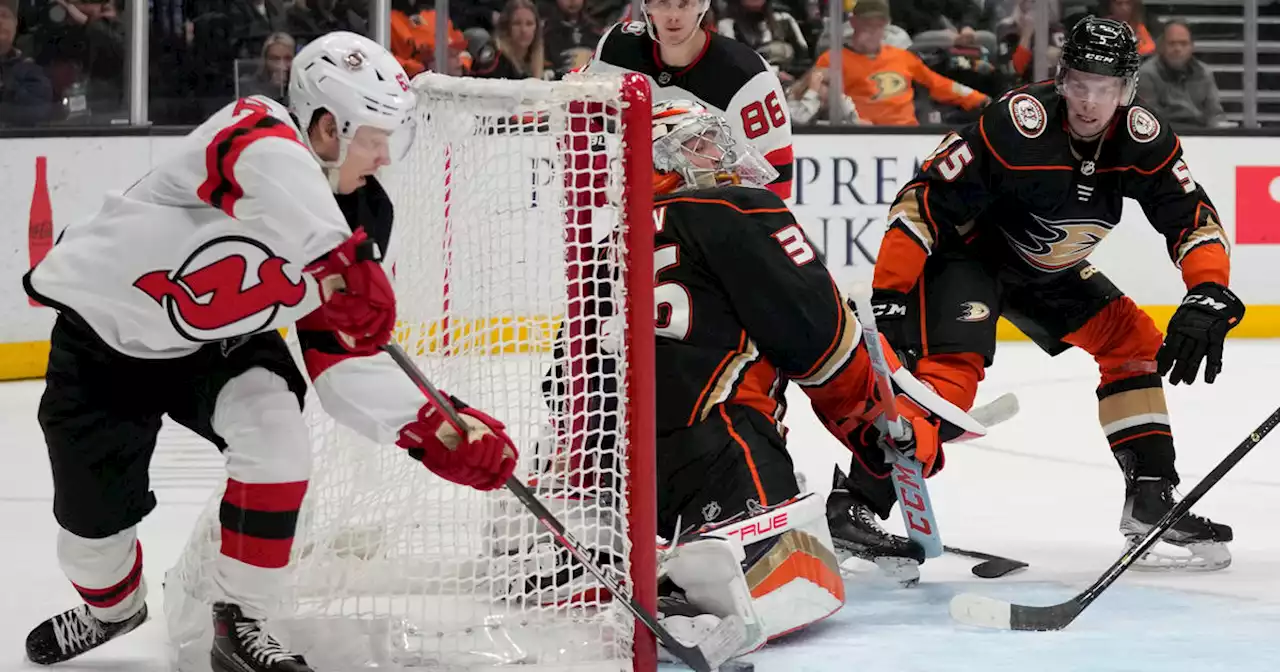 Hughes, Bratt lead Devils' 6-2 rout of Ducks