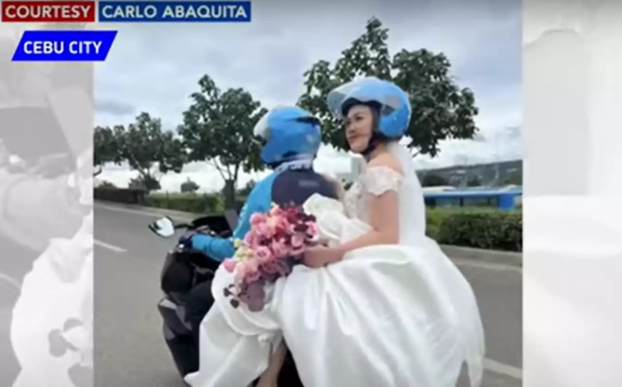 Bride hops on motorcycle after bridal car gets stuck in Sinulog traffic