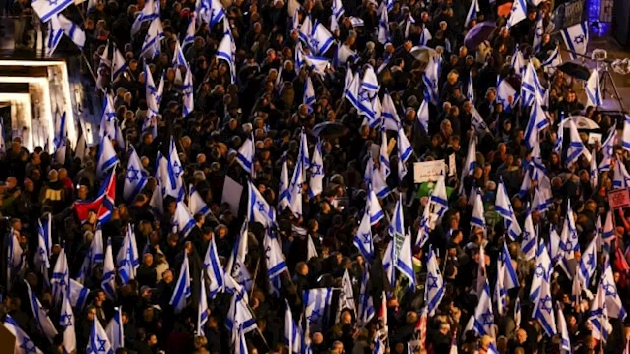 Tens of thousands protest Israeli government's proposed legal system changes | CBC News