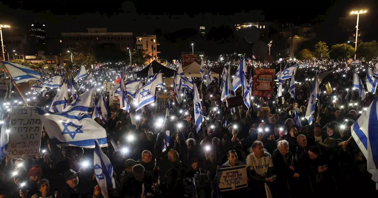 Tens of thousands protest new far-right Israeli government in Tel Aviv