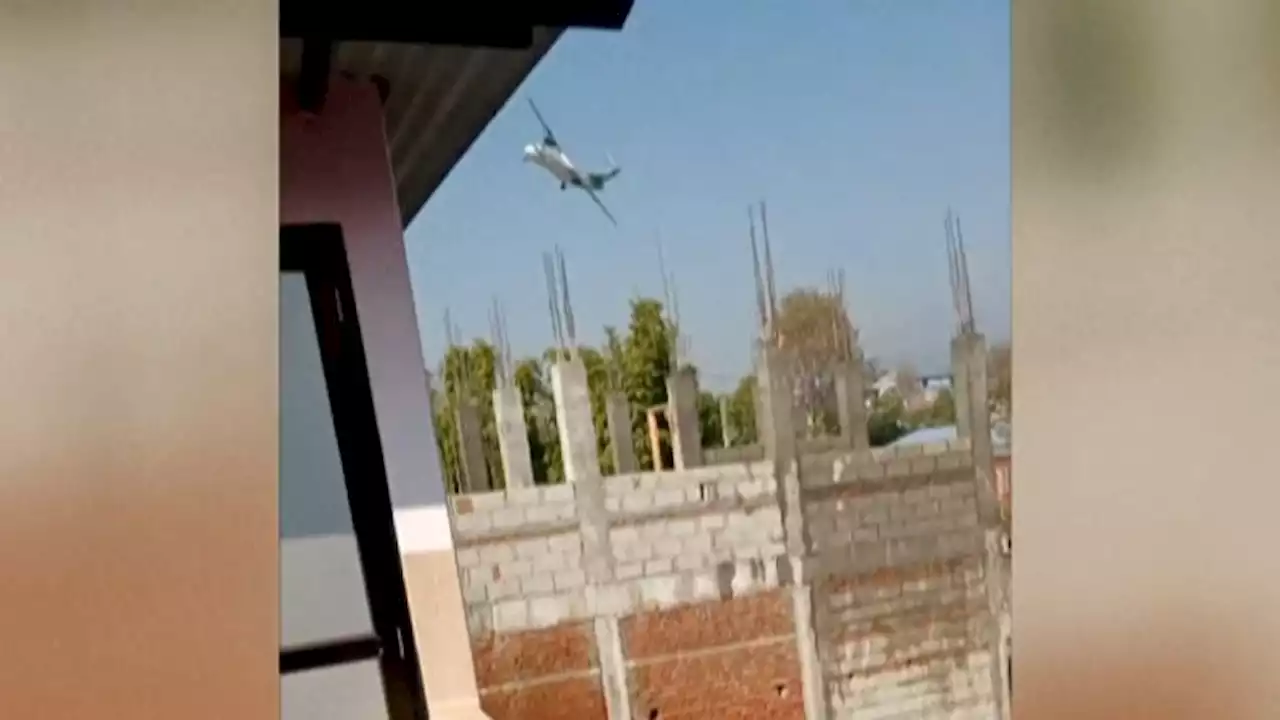 Video appears to show plane rolling on its side before crash in Nepal | CNN