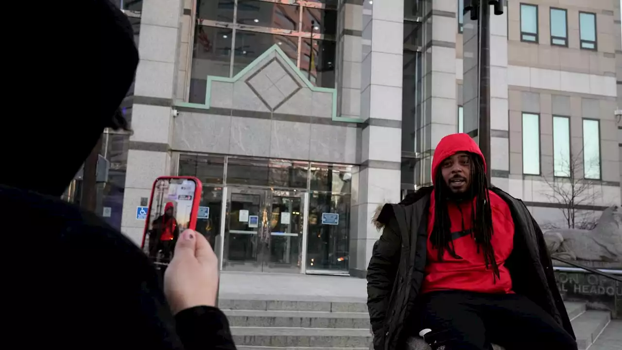 Advocates gather Downtown after autopsy of Sinzae Reed released to family