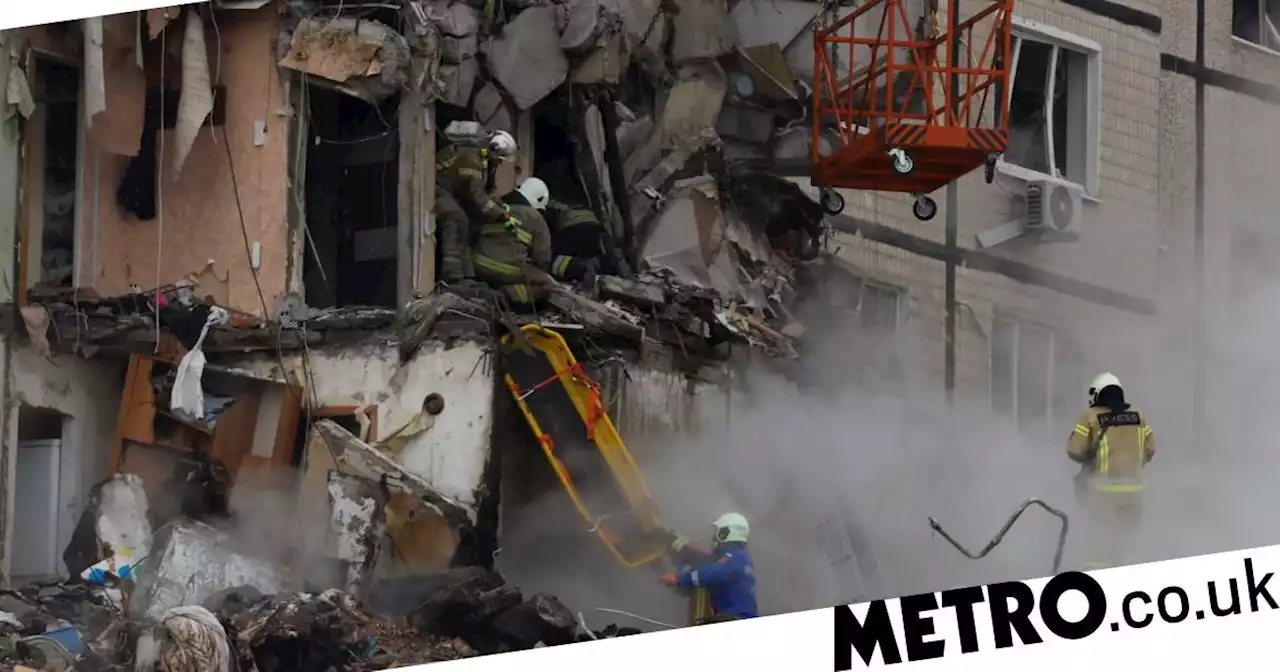 More than 20 bodies pulled from rubble of flat block after Russian strike