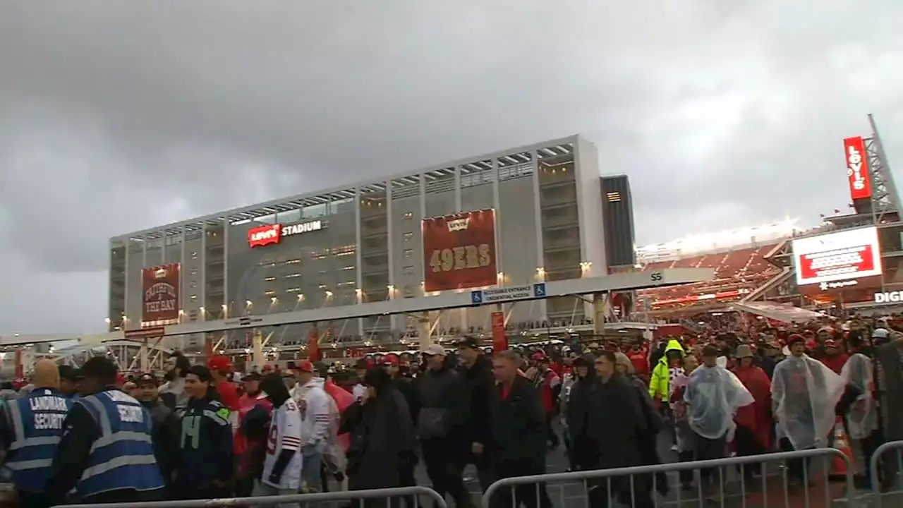 49ers fans enjoy dry wildcard match against Seahawks, followed by post-game downpour