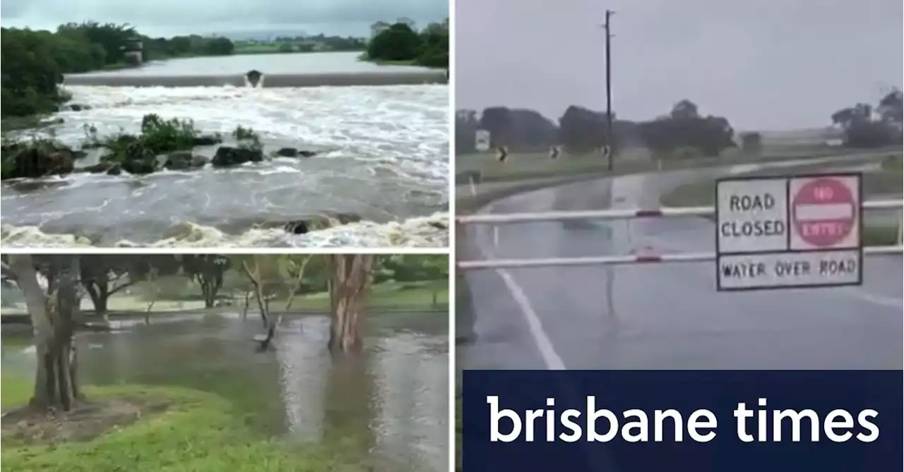 Women saved from rising water as north Queensland braces for deluge