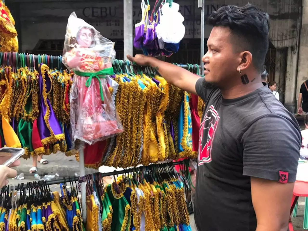 FIESTA SEÑOR 2023: Pampanga vendor travels to Cebu to sell Sto. Niño clothes, costumes