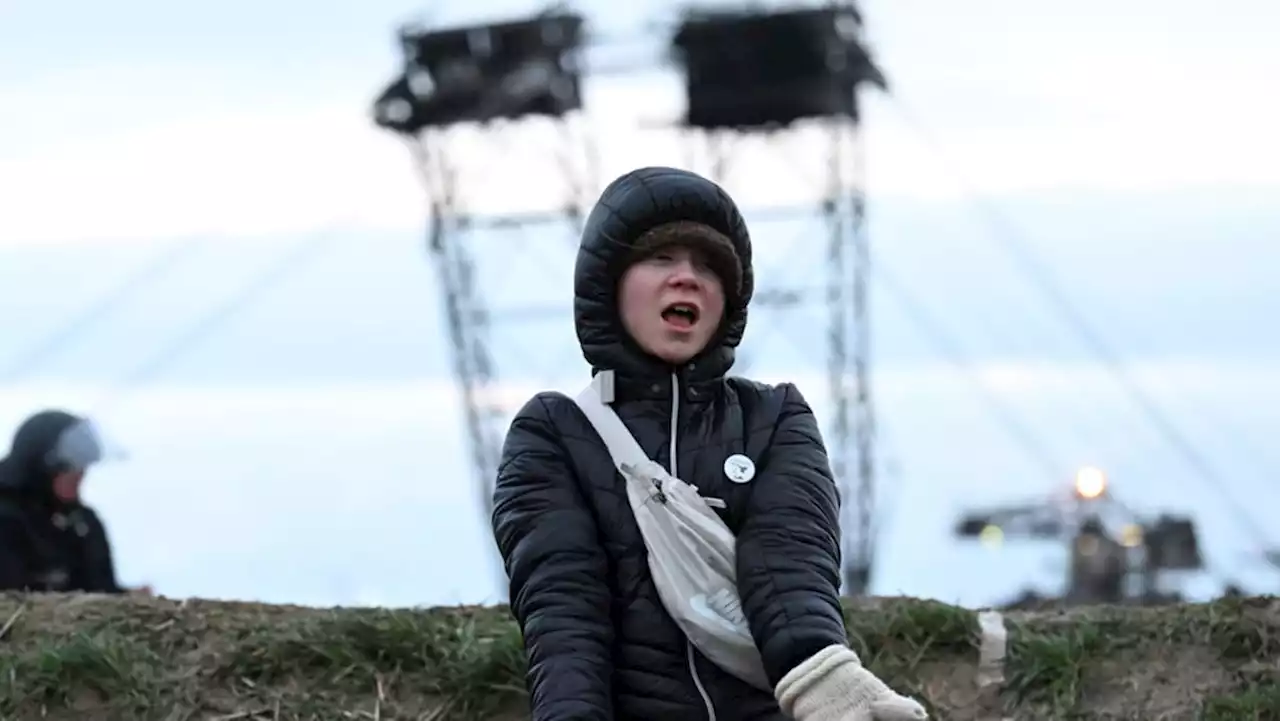 Climate activists occupy giant digger at German coal mine