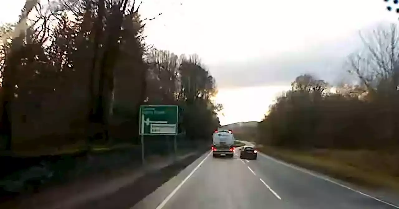 Heart-stopping moment driver overtakes lorry and veers into oncoming traffic