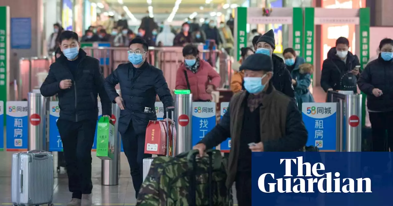 China braces for Covid surge as lunar new year travel rush begins