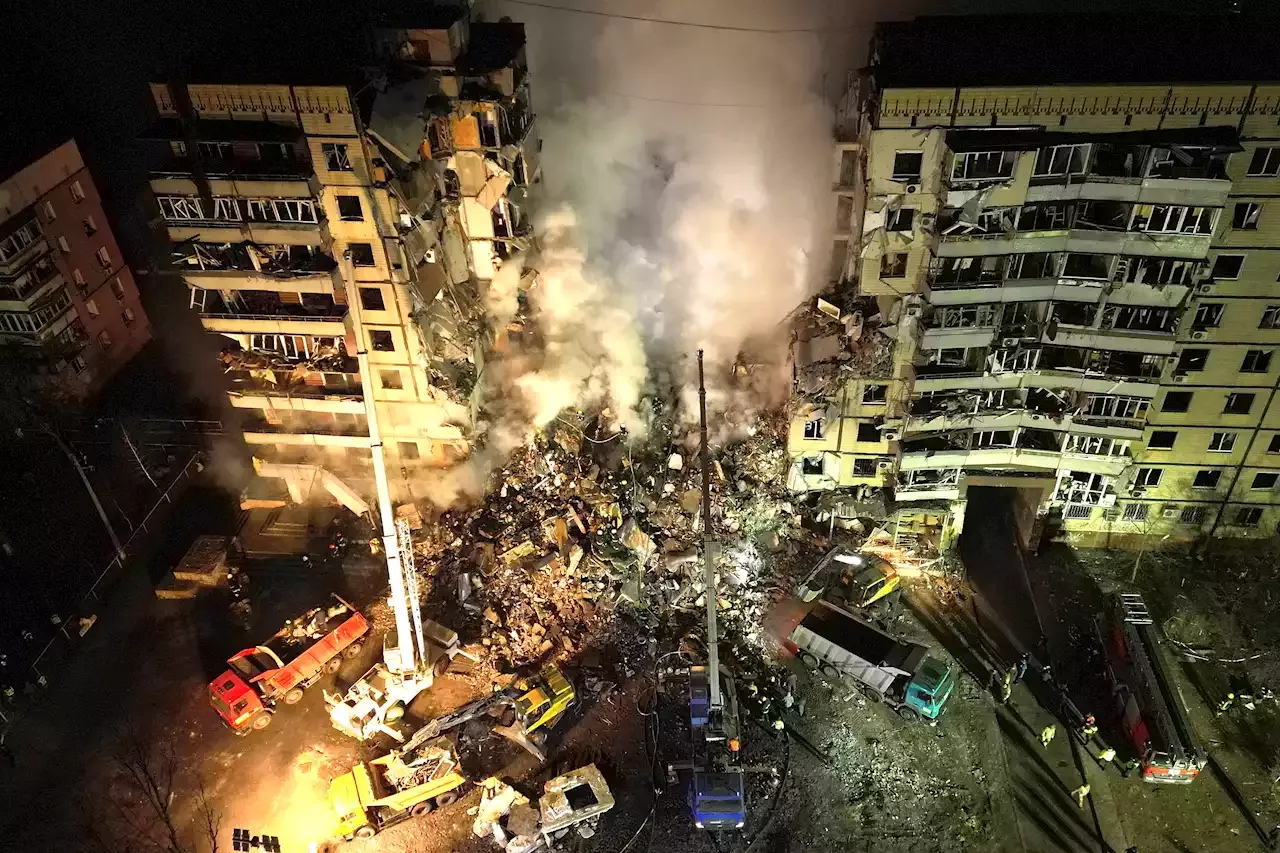 Russian Missile Hits Apartment Building In Ukraine, Killing 30; Workers ...