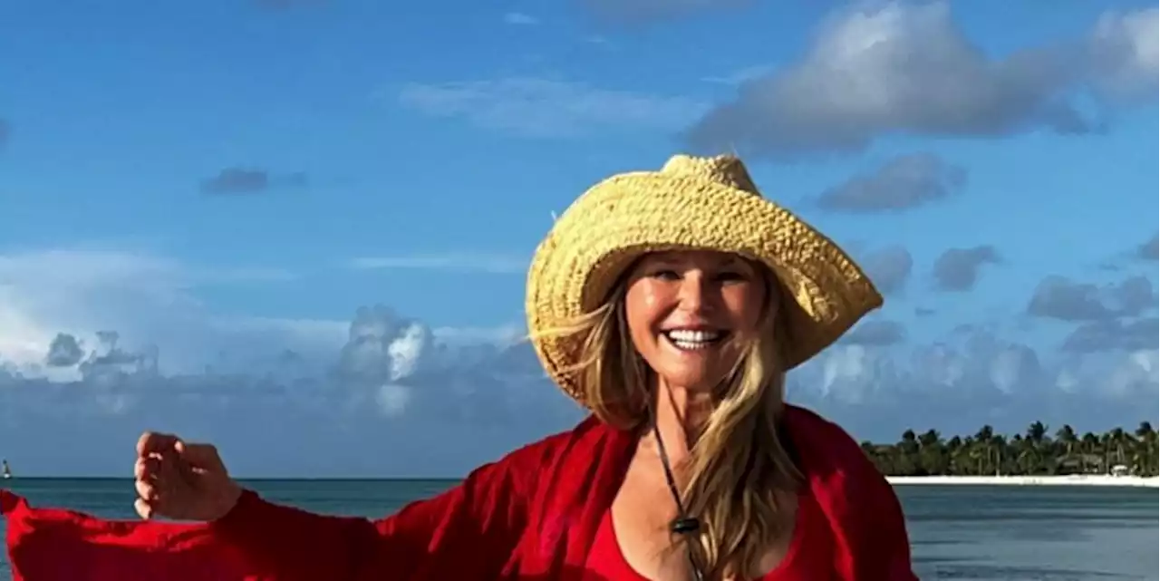 At 68, Christie Brinkley Glows in a Bold Red Swimsuit in Latest Beach Selfie