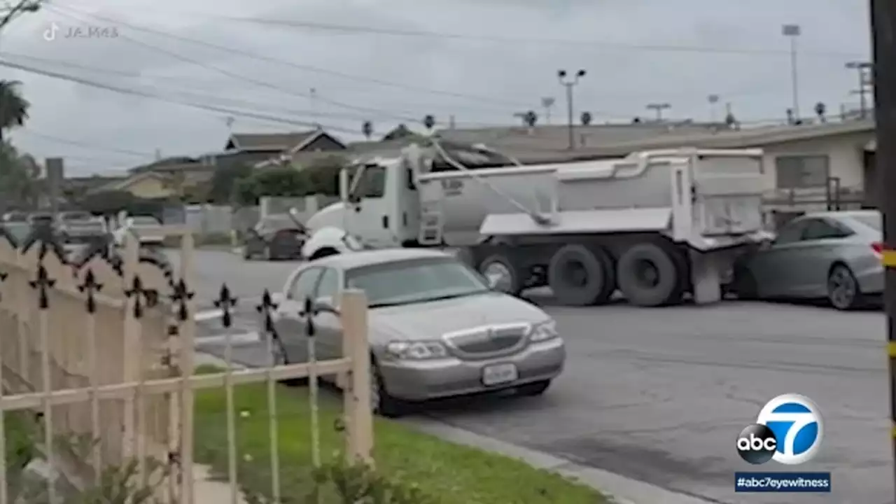 Man going through divorce crashes dump truck into wife's home, parked cars in South Los Angeles