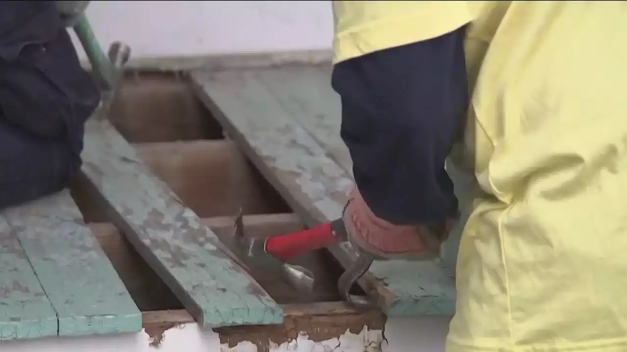 Volunteers build porch, ramp for 93-year-old's Third Ward home