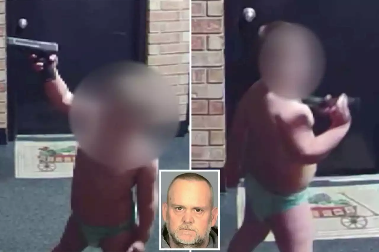 Indiana father arrested after toddler son seen waving gun on live TV