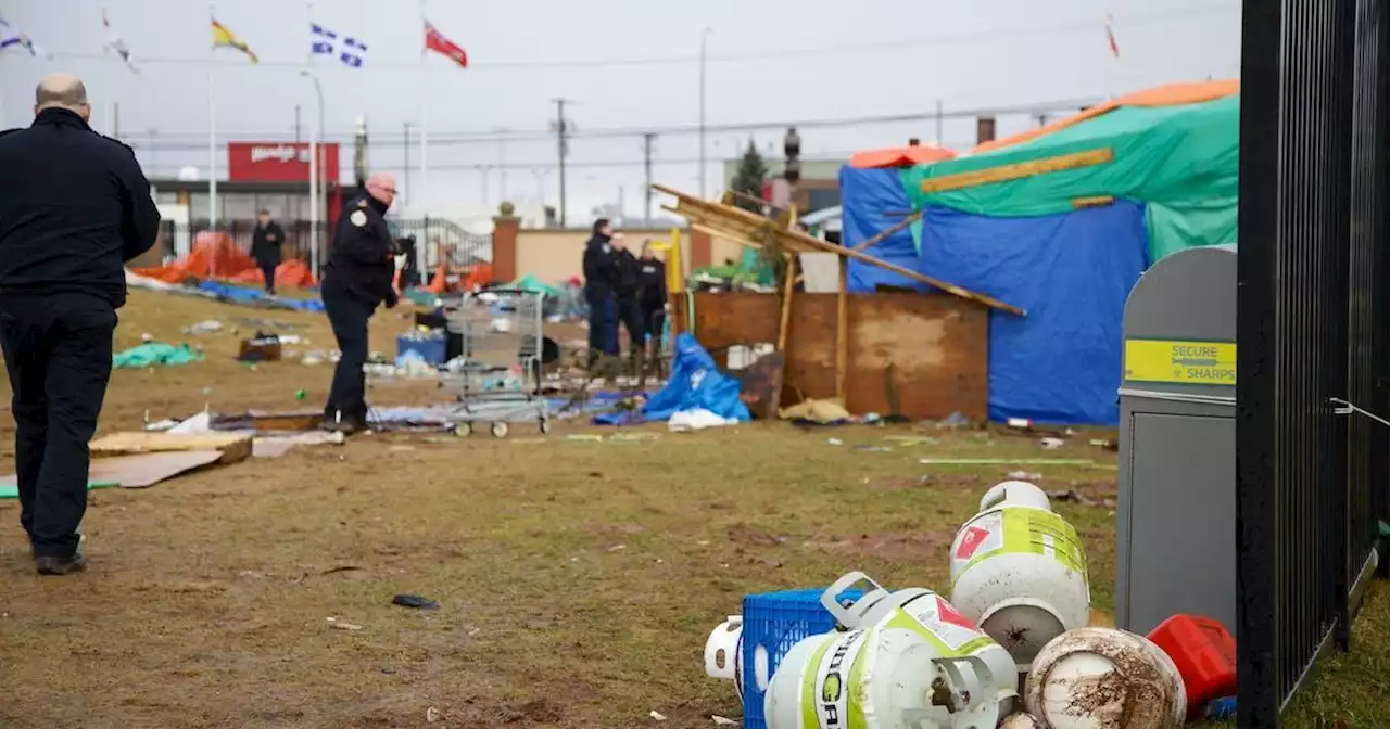 Barrel fire spurs removal of propane tanks, cooking equipment from Charlottetown tent encampment | SaltWire