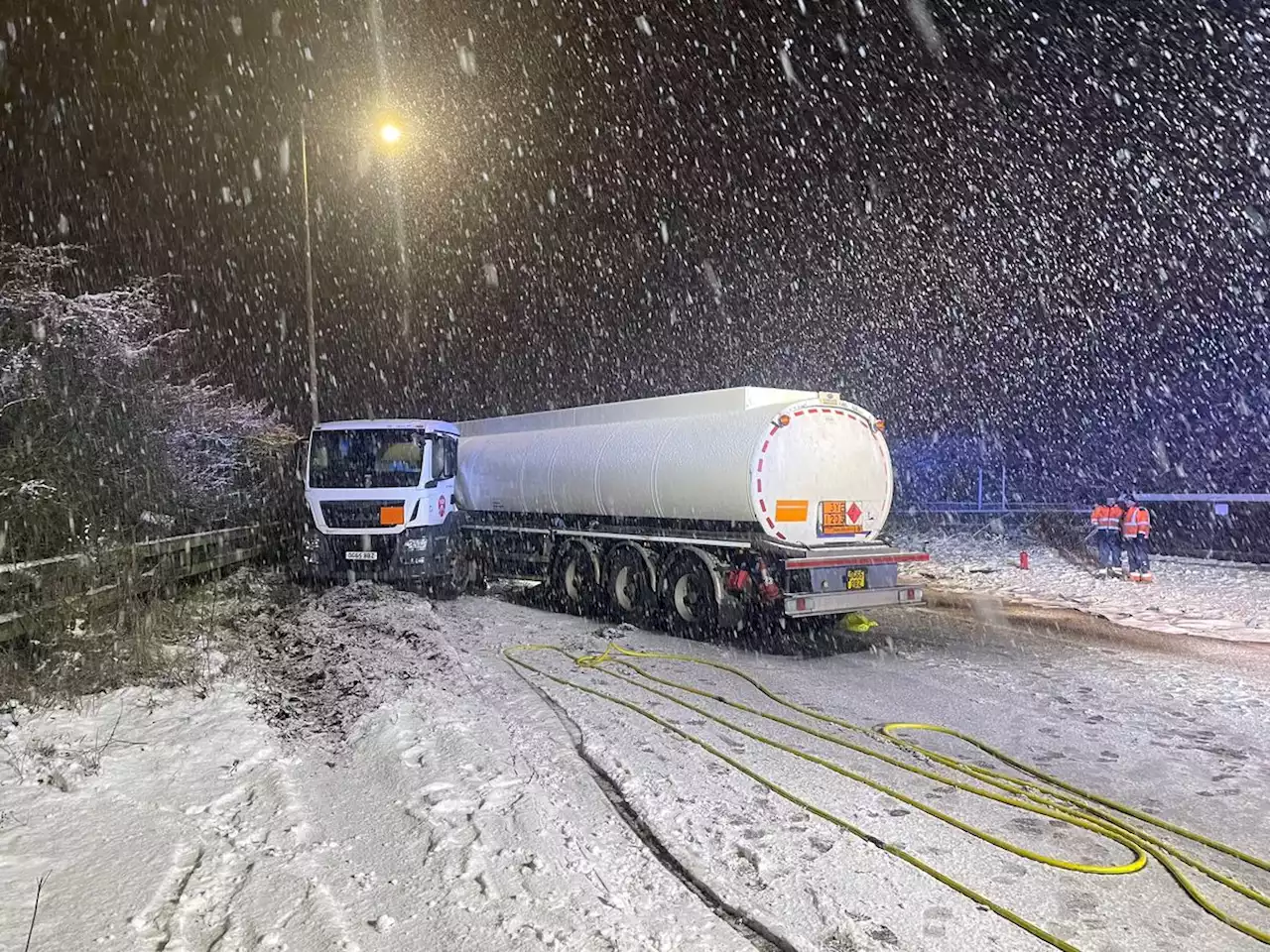 Crews clear diesel spill after tanker jackknifes in snow on A41 at Whitchurch