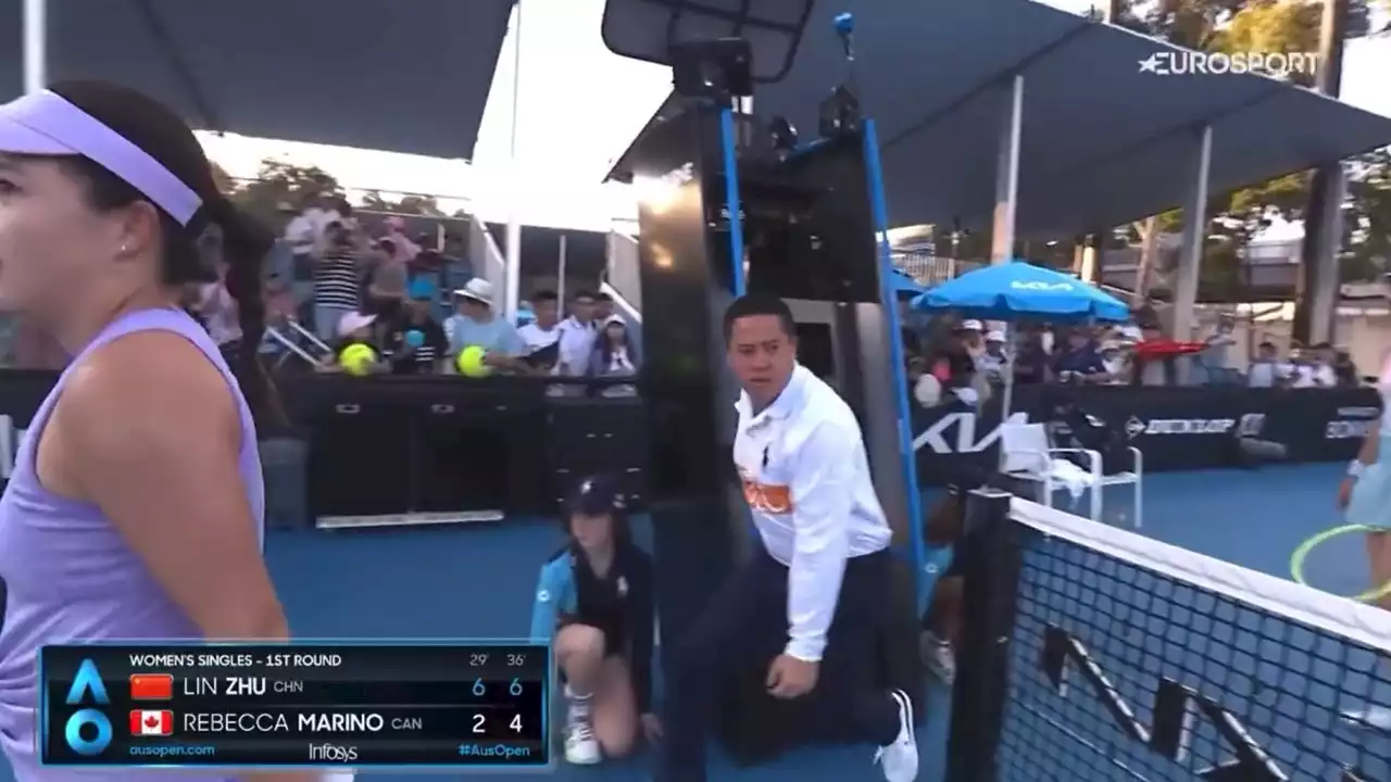 Wild moment umpire jumps out of chair and chases spectator at Australian Open