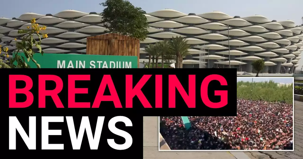 Two dead and dozens injured after stampede outside football stadium