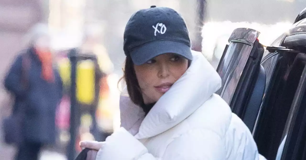 Cheryl throws it back to 2007 with wedged trainers and we're concerned