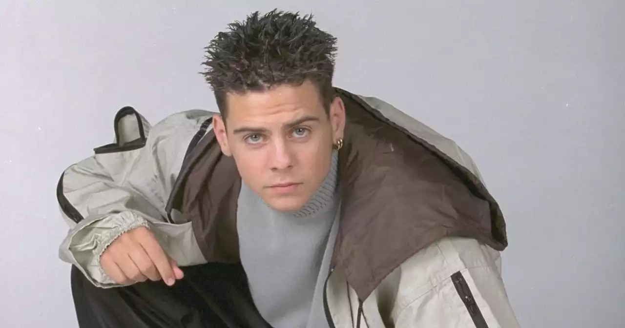 Scott from 5ive looks almost unrecognisable as he sports bushy beard in new pics