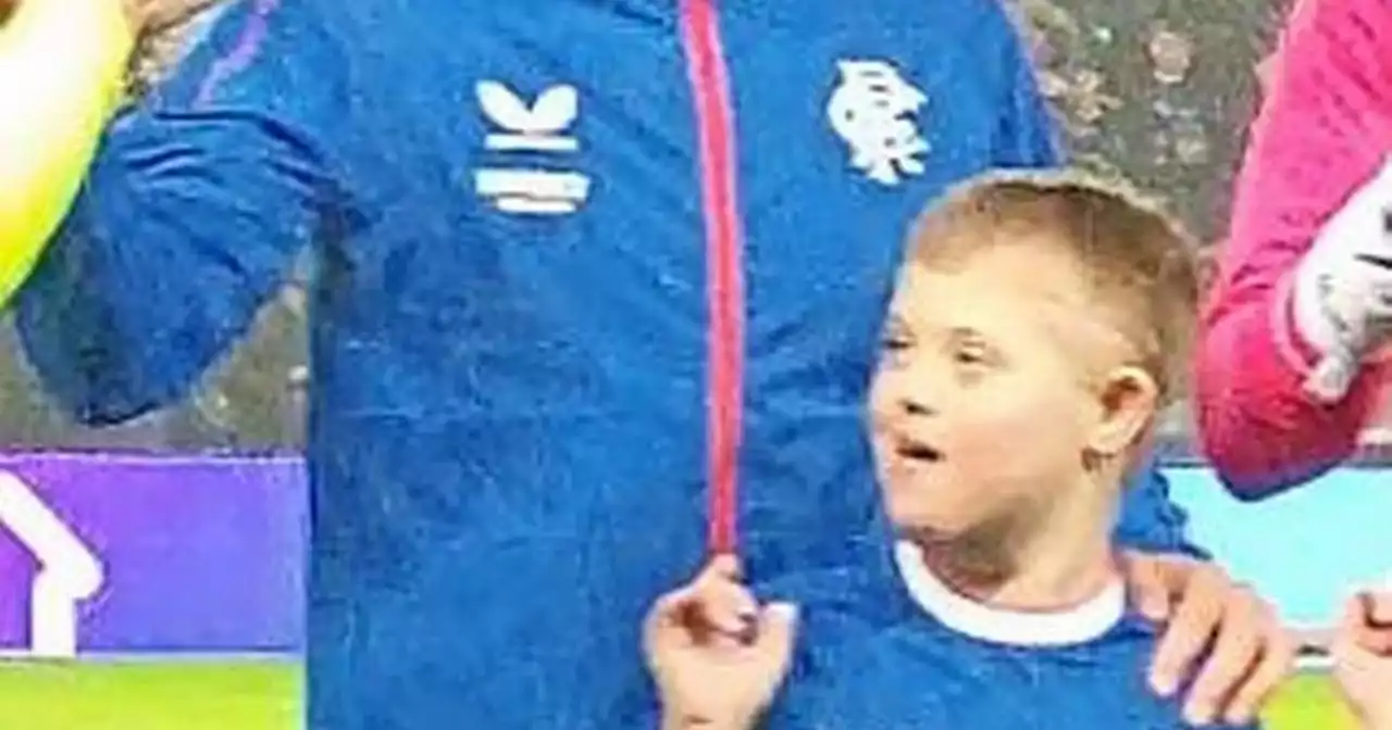 Schoolboy with Down’s syndrome ditches wheelchair to lead Rangers