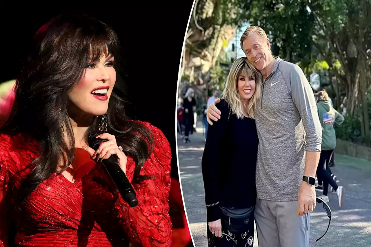 Marie Osmond debuts her new look in photo with husband Steve Craig at Disney World